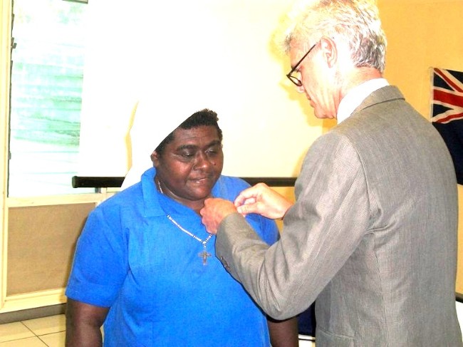Sister Loraine awarded by Australian High Commissioner Ian Kemish 